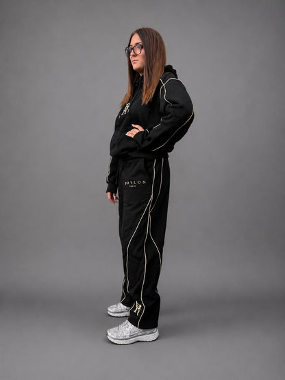 Ensemble Élite 2026 noir BRYLON PARIS porté par une femme de profil gauche